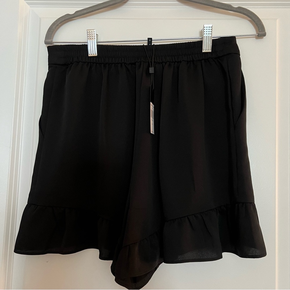 Black Ruffle Hem Shorts